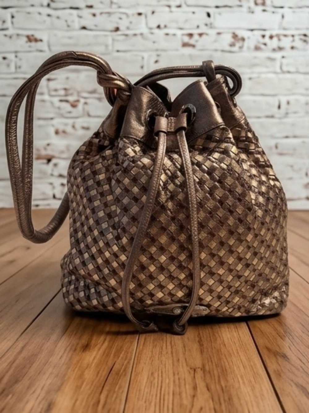 Elliot Lucca Metallic Bronze signature woven leather Drawstring Shoulder Bag